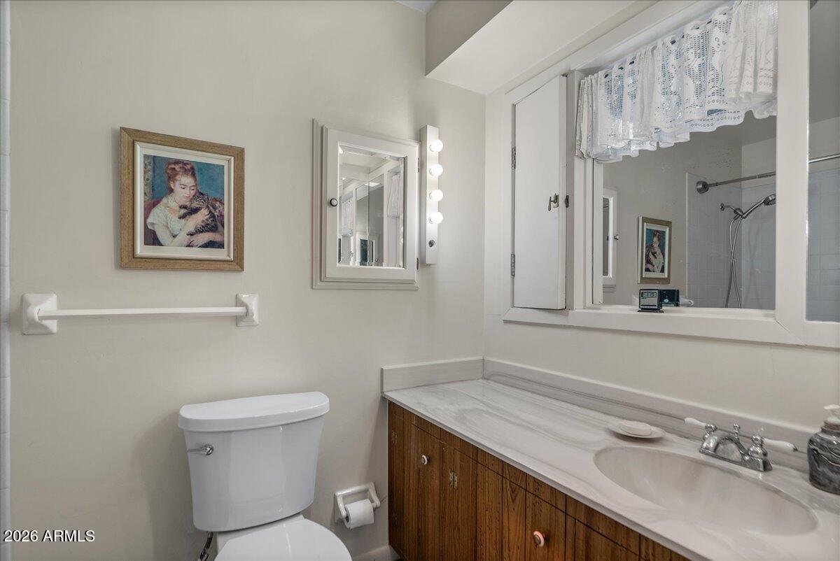 103 North Harding Drive Sedona, AZ 86336 - Photo 23 of 62 a bathroom with a sink and a toilet