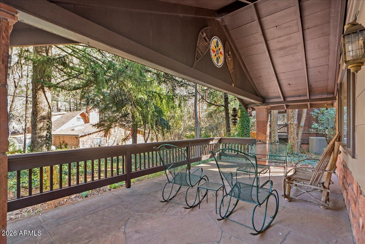 103 North Harding Drive Sedona, AZ 86336 - Photo 6 of 62 a view of a chairs and table in the balcony