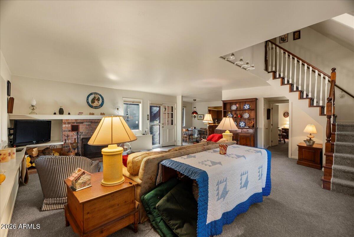 103 North Harding Drive Sedona, AZ 86336 - Photo 8 of 62 a bed room with a bed and a tv