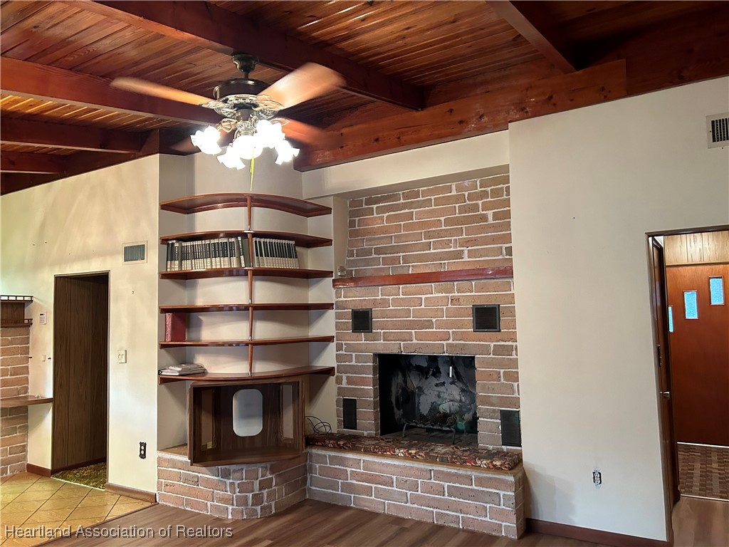 3505 Golfview Road Sebring, FL 33875 - Photo 16 of 50 a kitchen with a stove and a fireplace