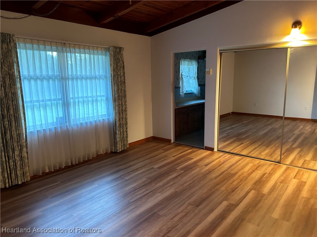 3505 Golfview Road Sebring, FL 33875 - Photo 24 of 50 a view of empty room with wooden floor