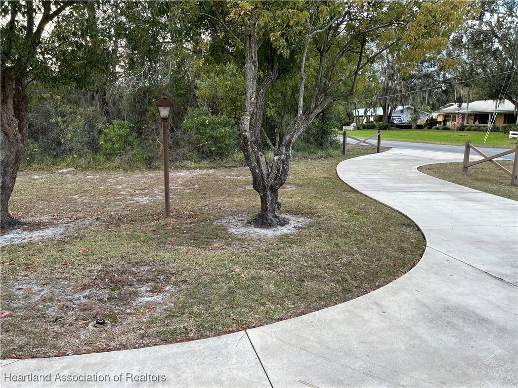 3505 Golfview Road Sebring, FL 33875 - Photo 3 of 50 a view of a park with swings