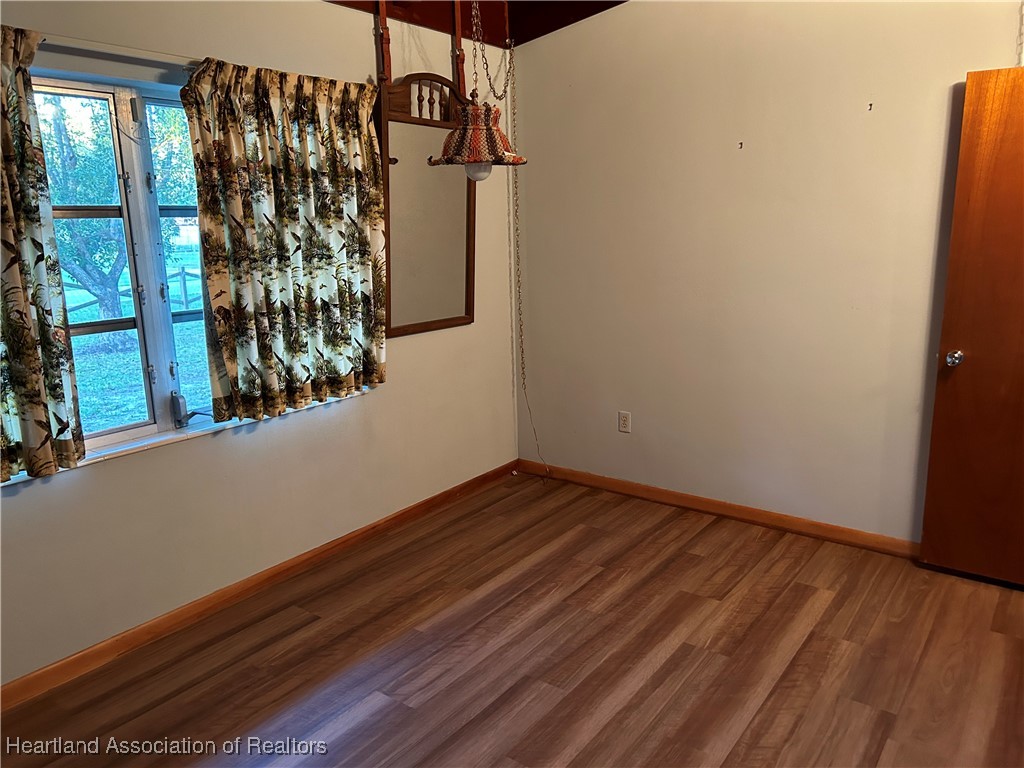 3505 Golfview Road Sebring, FL 33875 - Photo 33 of 50 a view of entryway with wooden floor