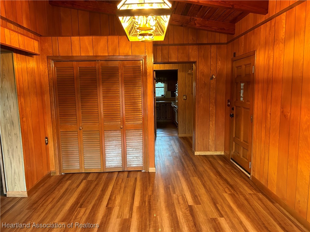 3505 Golfview Road Sebring, FL 33875 - Photo 8 of 50 a view of a room with wooden floor and a bathroom