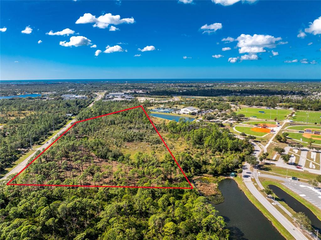 River Road Englewood, FL 34223 - Photo 16 of 20 a view of a room with lots of green space and mountain view