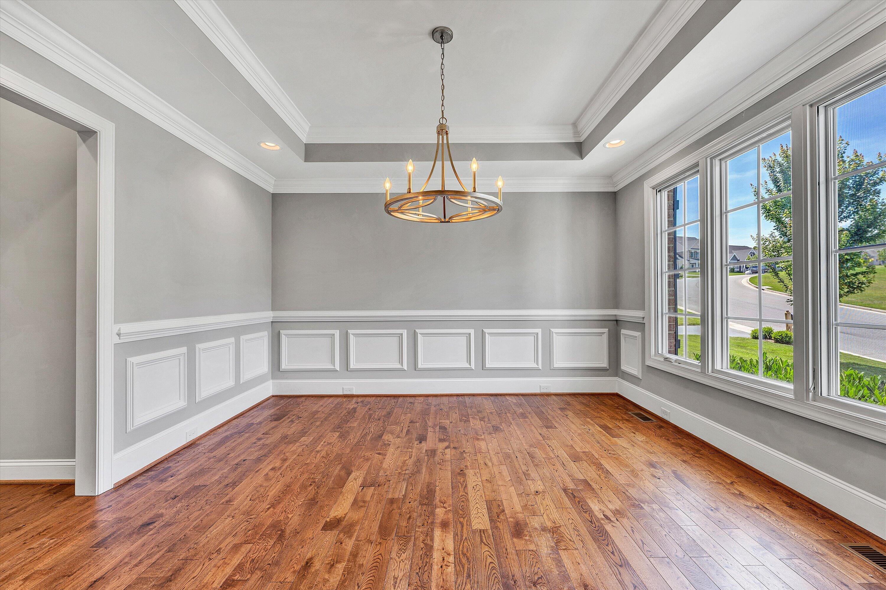 6981 Fairway Ridge Road Salem, VA 24153 - Photo 10 of 53 a view of empty room with wooden floor and fan