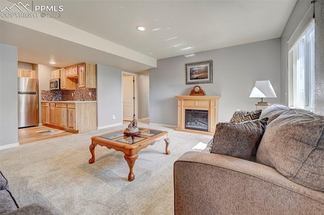 9470 Rockingham Drive Peyton, CO 80831 - Photo 25 of 39 additional basement space with kithcenette access