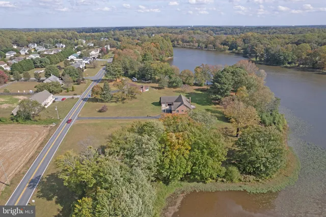 an aerial view of residential house with outdoor space