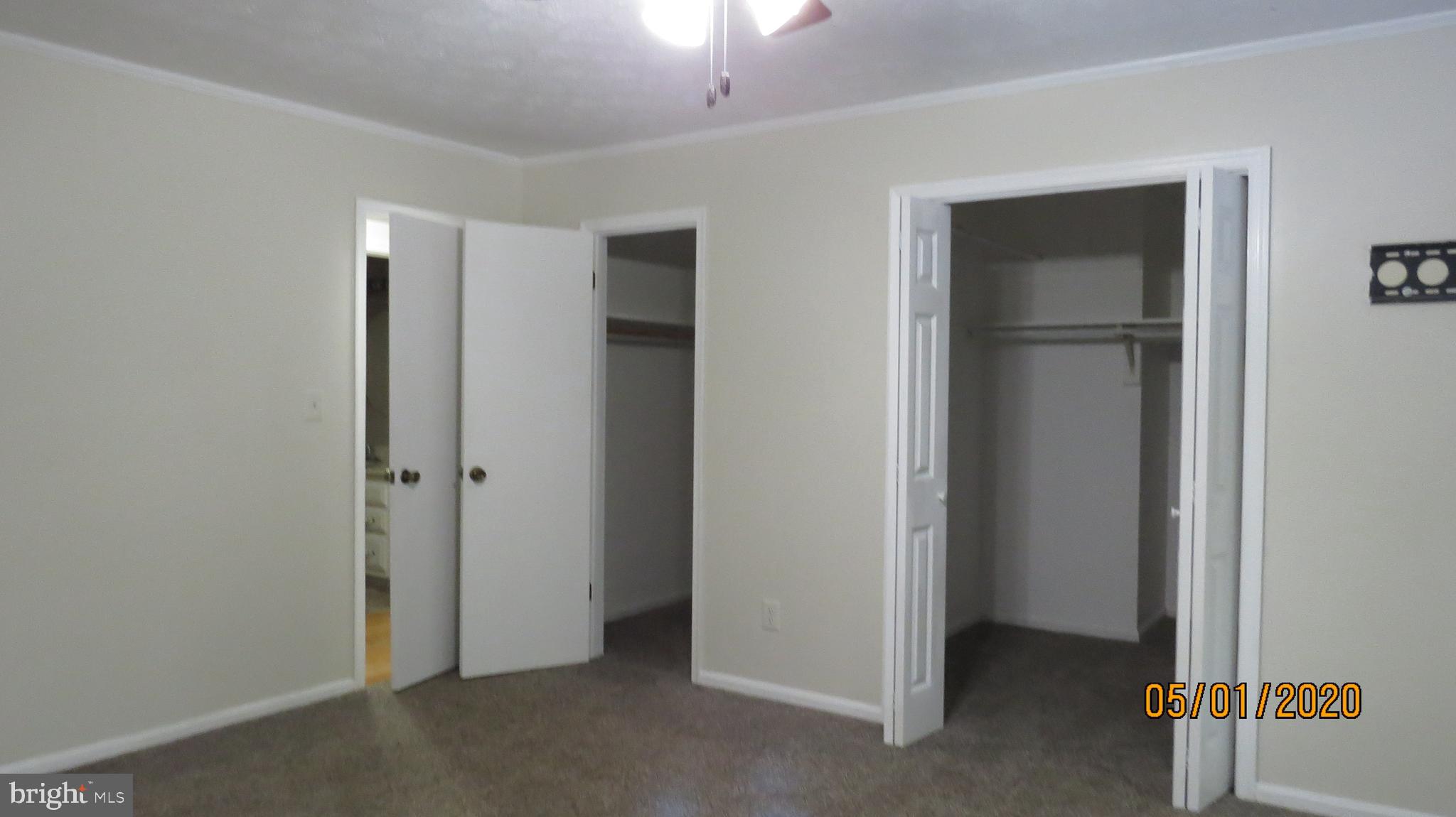 22191 Berry Run Road Orange, VA 22960 - Photo 33 of 42 His and her walk in closets in master bedroom