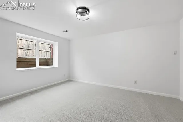 an empty room with a window