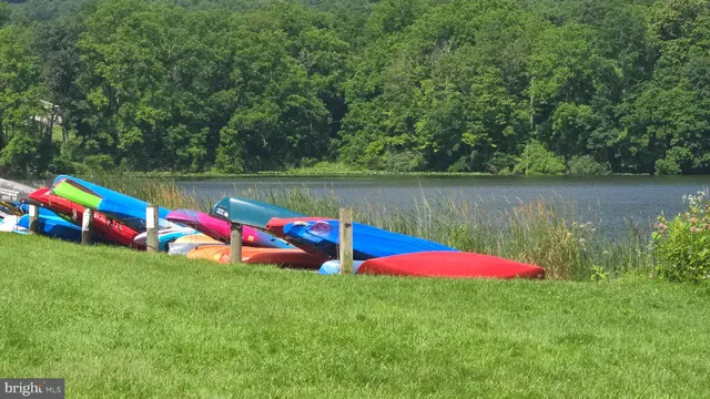 a view of play ground with a table and chairs