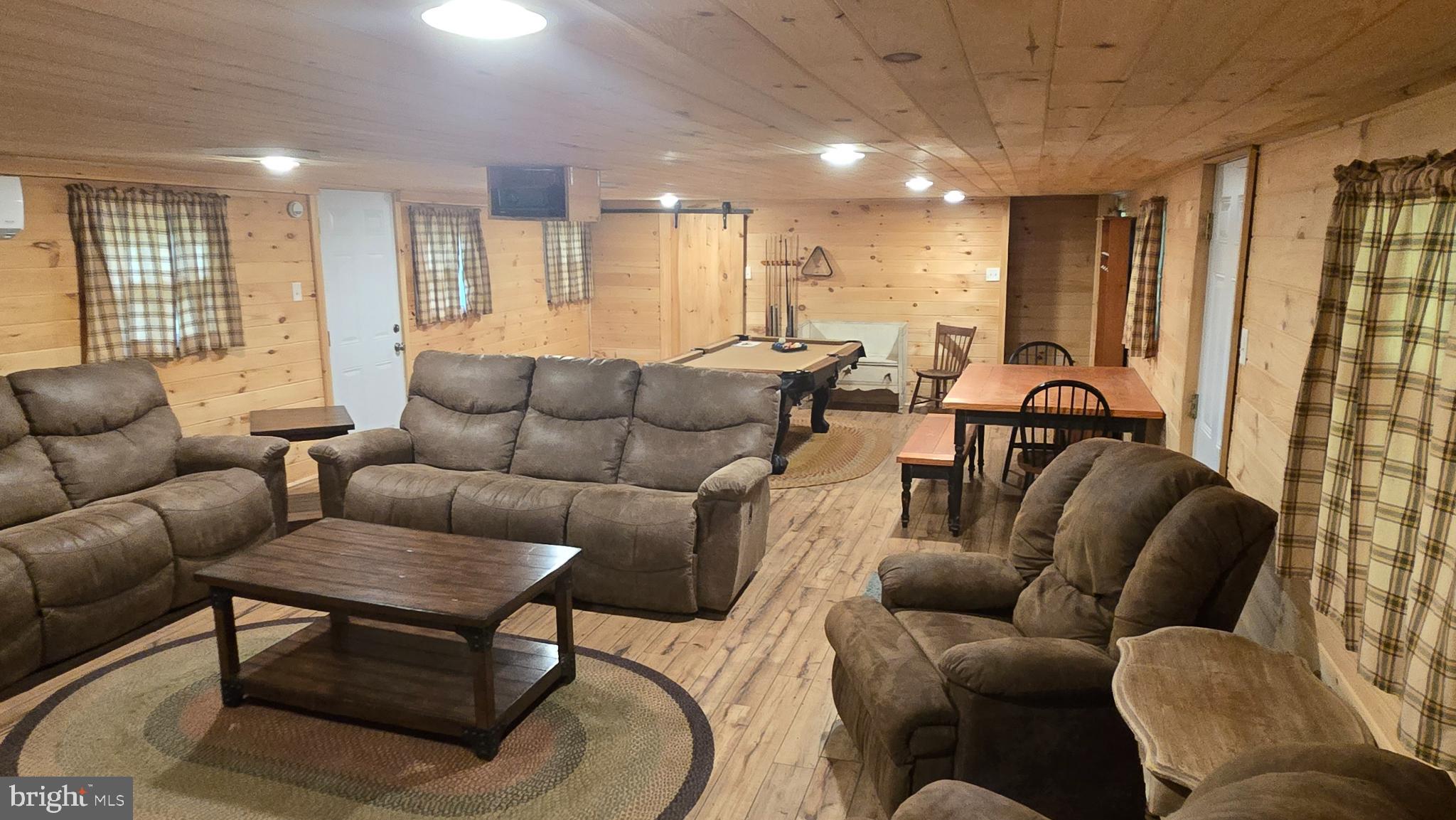 212 Thickhead Mountain Road Centre Hall, PA 16828 - Photo 19 of 28 a living room with furniture kitchen view and a large window