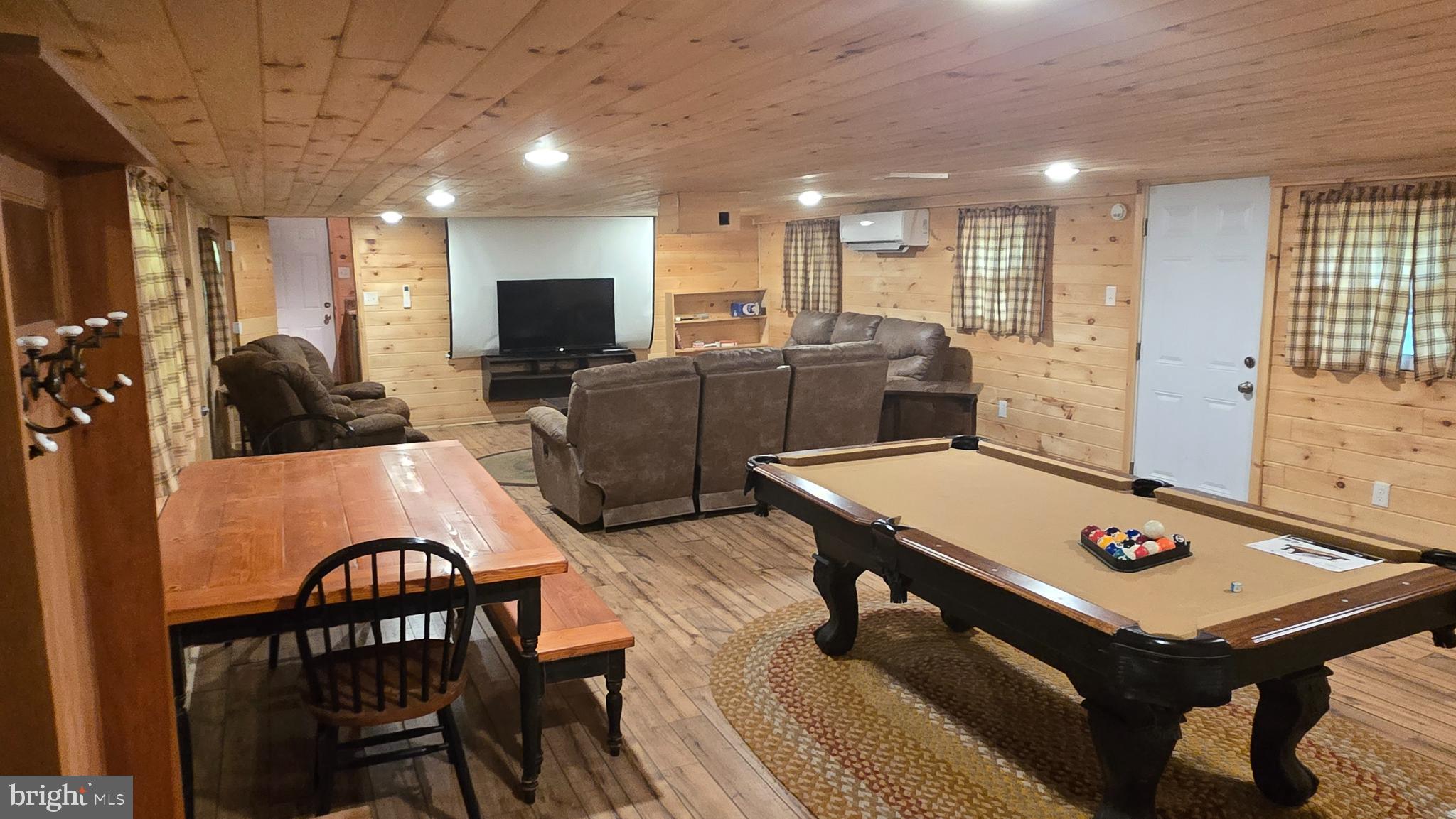 212 Thickhead Mountain Road Centre Hall, PA 16828 - Photo 21 of 28 a living room with furniture pool table and a flat screen tv