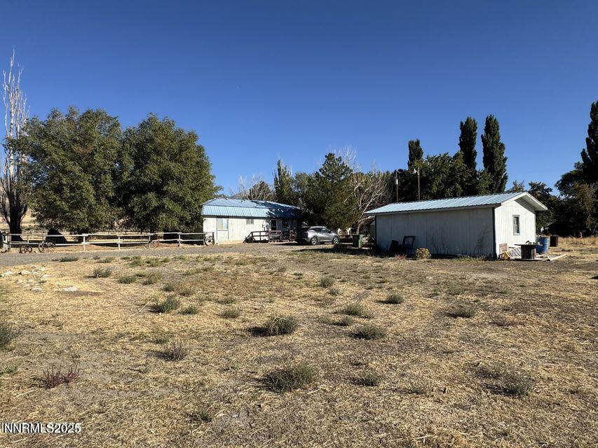 40 Basque Road Orovada, NV 89425 - Photo 3 of 16 a view of a house with a yard