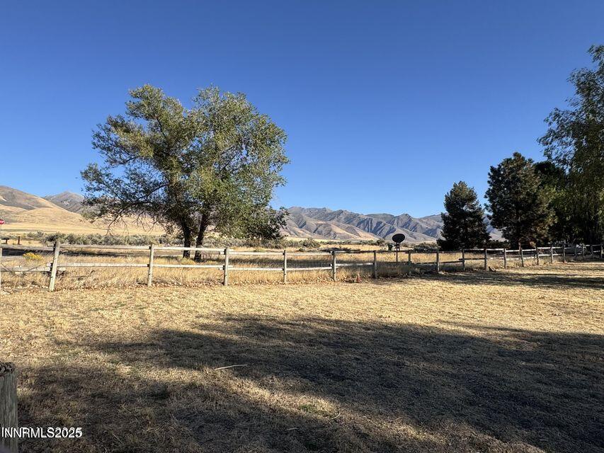 40 Basque Road Orovada, NV 89425 - Photo 6 of 16 a view of a lake with trees in the background