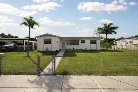 a view of a house with a swimming pool