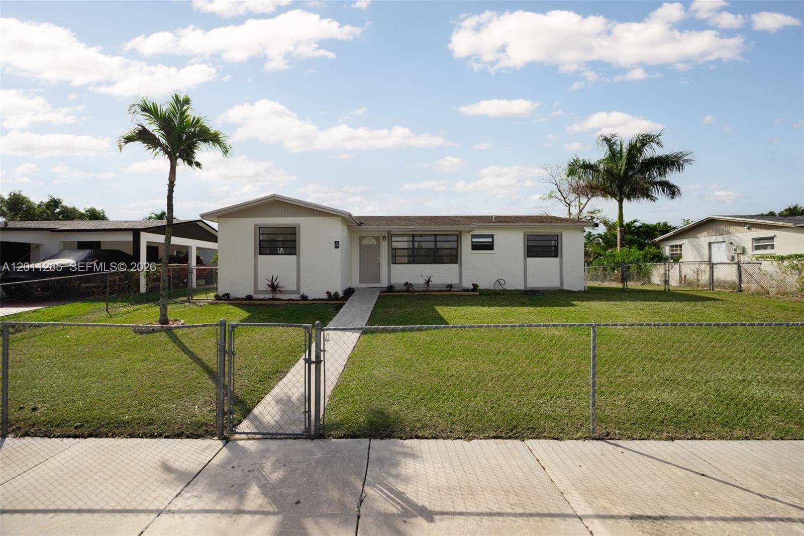 29935 Southwest 143rd Court Homestead, FL 33033 - Photo 1 of 25 a view of a house with a swimming pool