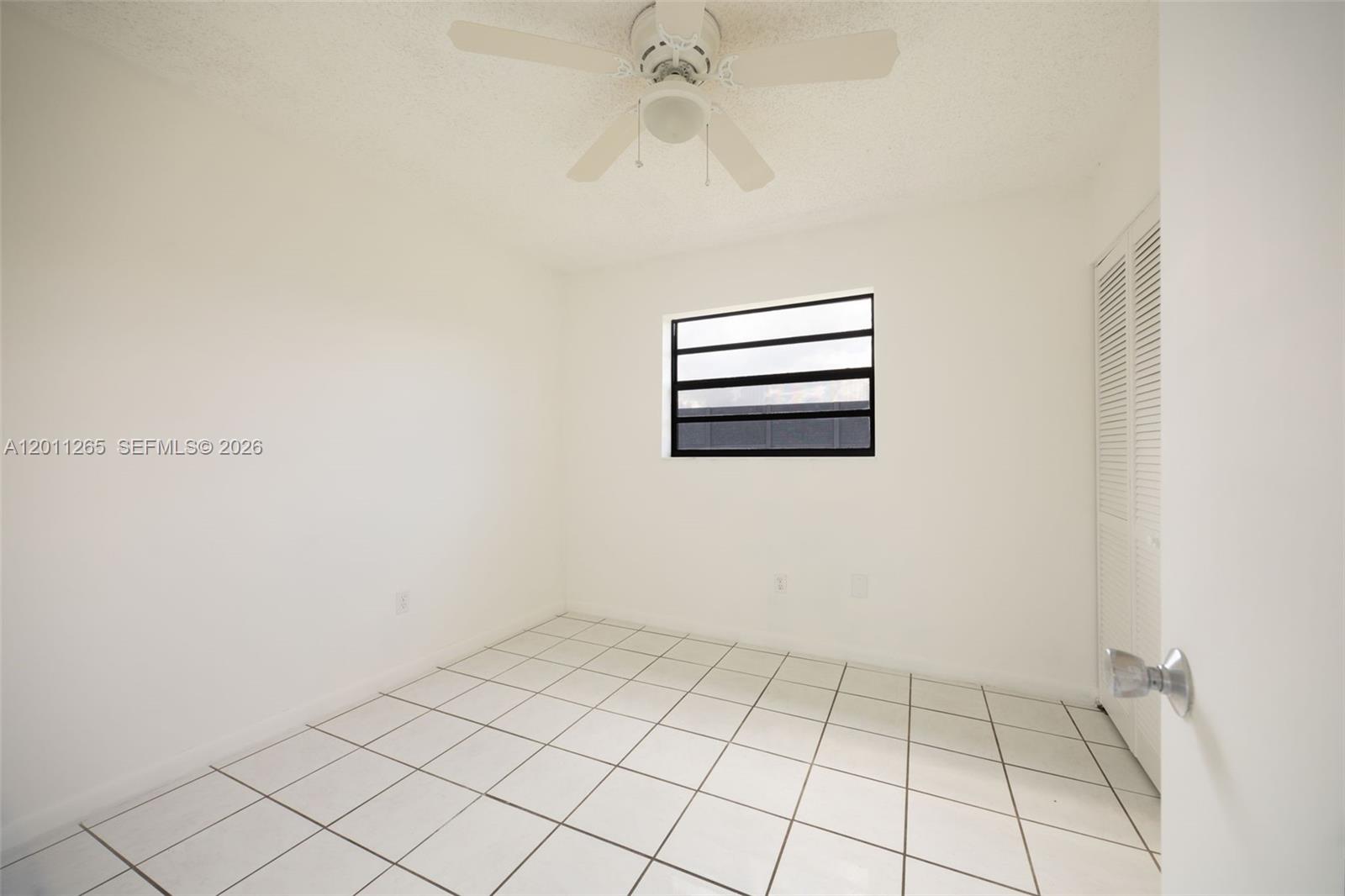 29935 Southwest 143rd Court Homestead, FL 33033 - Photo 14 of 25 a view of a room with window