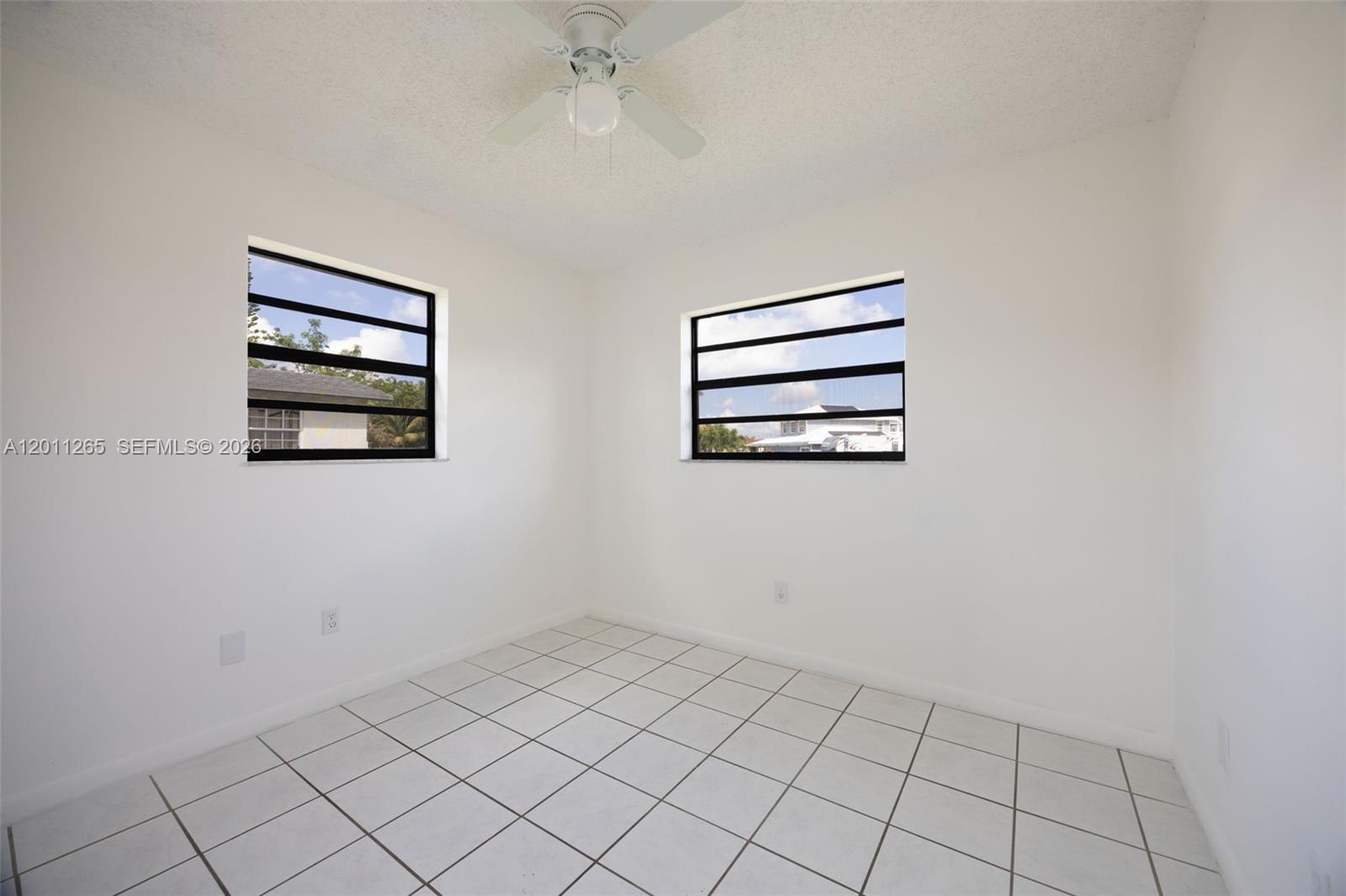 29935 Southwest 143rd Court Homestead, FL 33033 - Photo 17 of 25 a view of a room with storage