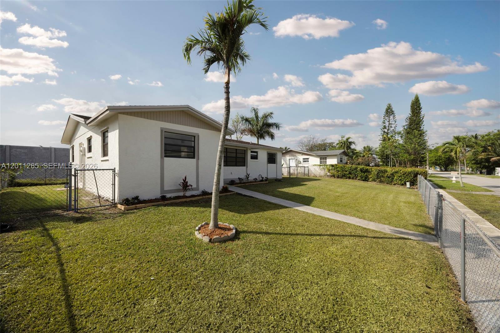 29935 Southwest 143rd Court Homestead, FL 33033 - Photo 4 of 25 a view of a house with a swimming pool