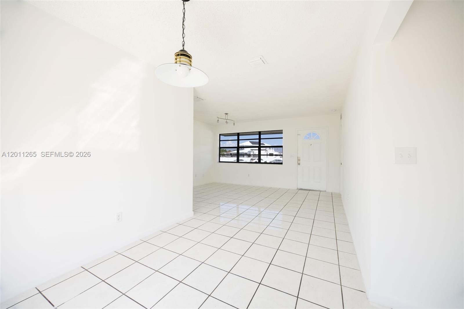 29935 Southwest 143rd Court Homestead, FL 33033 - Photo 9 of 25 a view of an empty room
