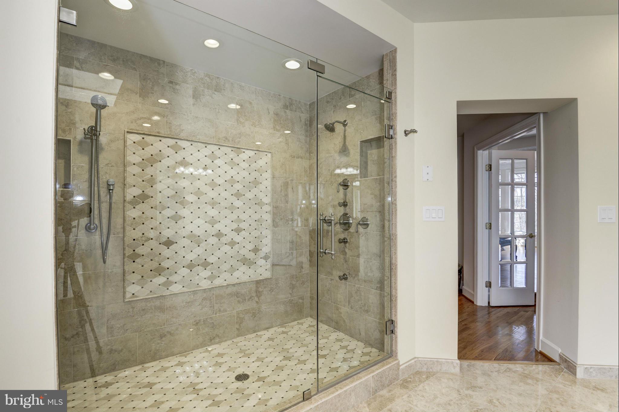 11112 Potomac View Drive Potomac, MD 20854 - Photo 19 of 30 a bathroom with a shower and a mirror