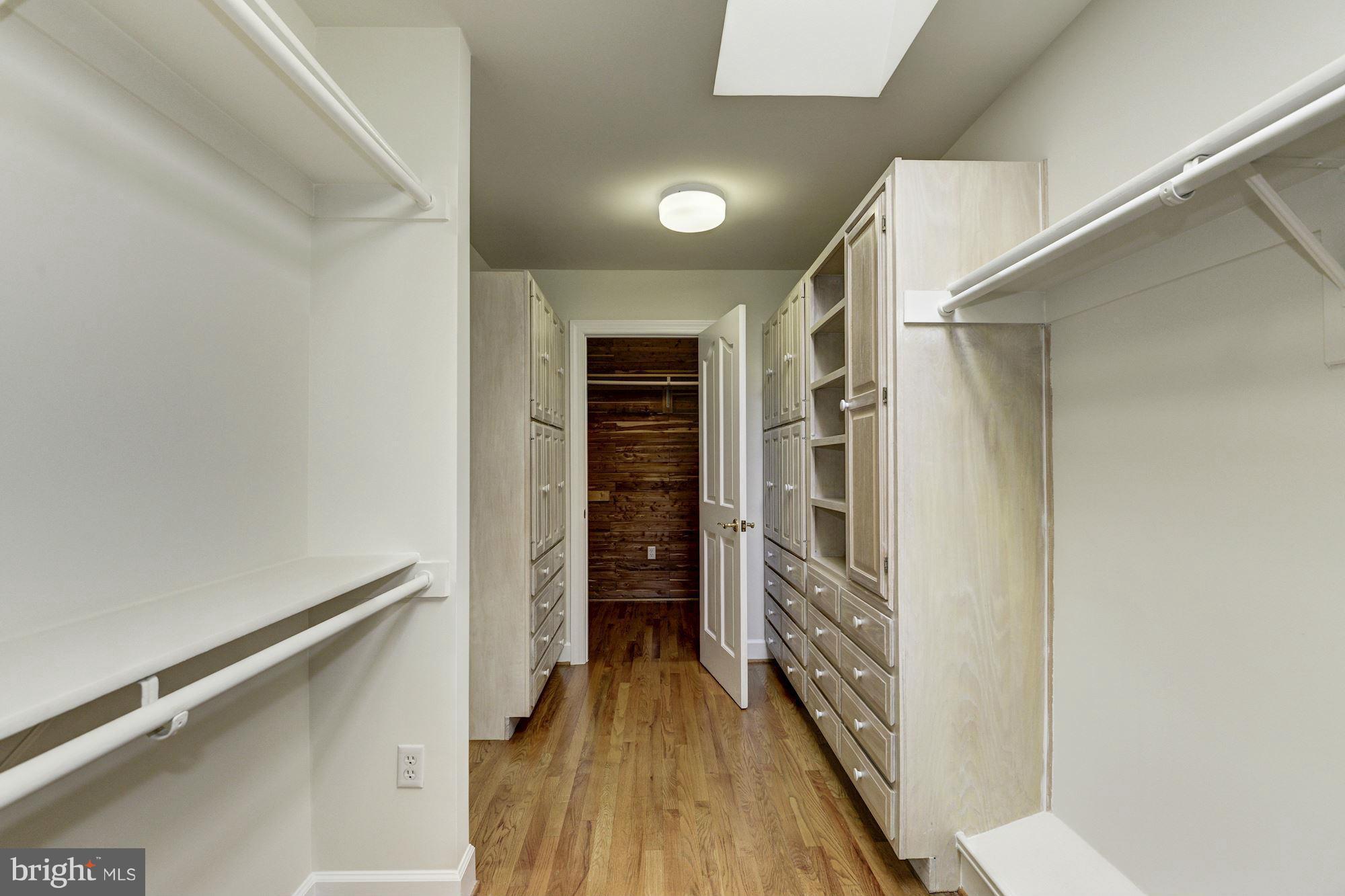 11112 Potomac View Drive Potomac, MD 20854 - Photo 20 of 30 a view of walk in closet with wooden floor
