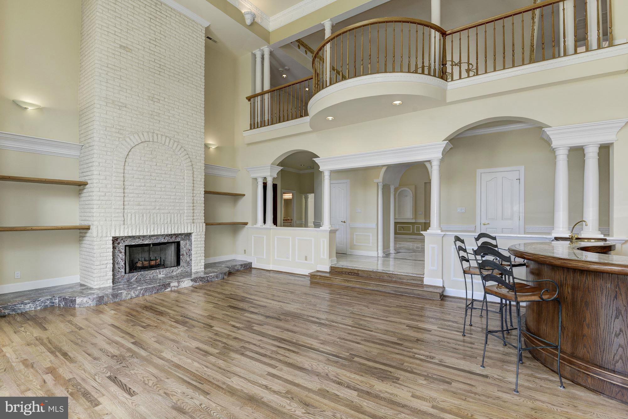 11112 Potomac View Drive Potomac, MD 20854 - Photo 7 of 30 a view of livingroom with furniture and fireplace