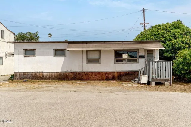 a view of a house with a patio