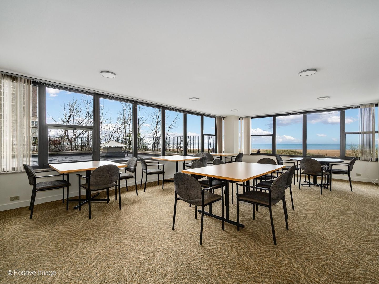 5801 North Sheridan Road, Unit 16B Chicago, IL 60660 - Photo 21 of 23 a view of a dining room with furniture and window