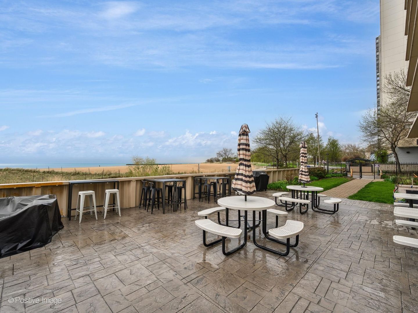 5801 North Sheridan Road, Unit 16B Chicago, IL 60660 - Photo 23 of 23 a view of a terrace with chairs