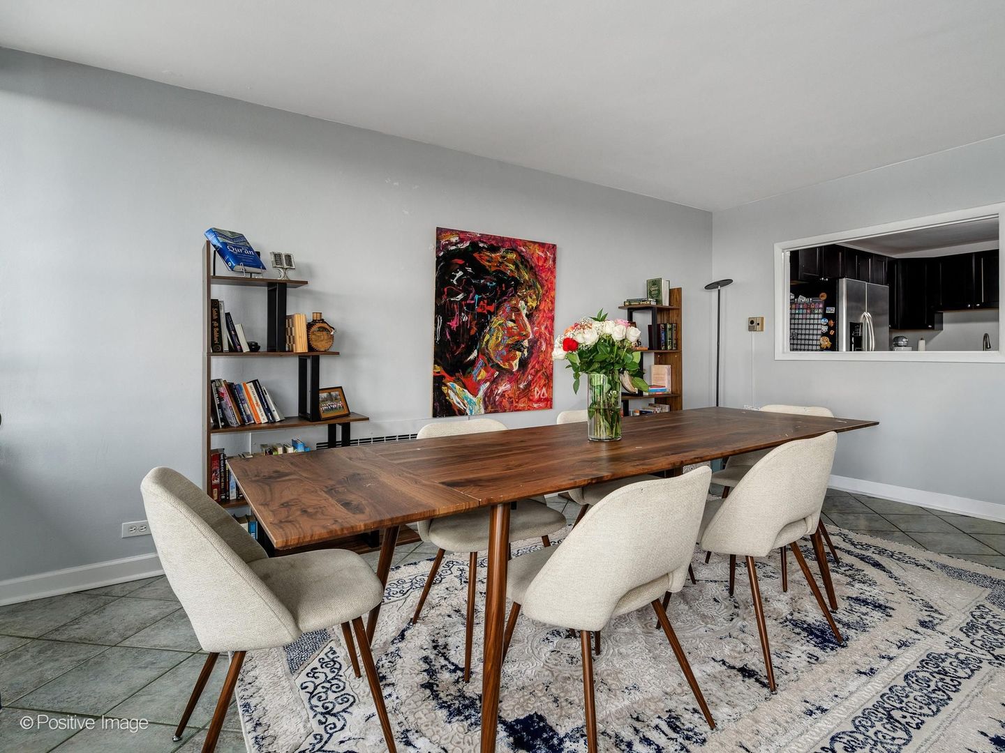 5801 North Sheridan Road, Unit 16B Chicago, IL 60660 - Photo 9 of 23 a view of a dining room with furniture and wooden floor