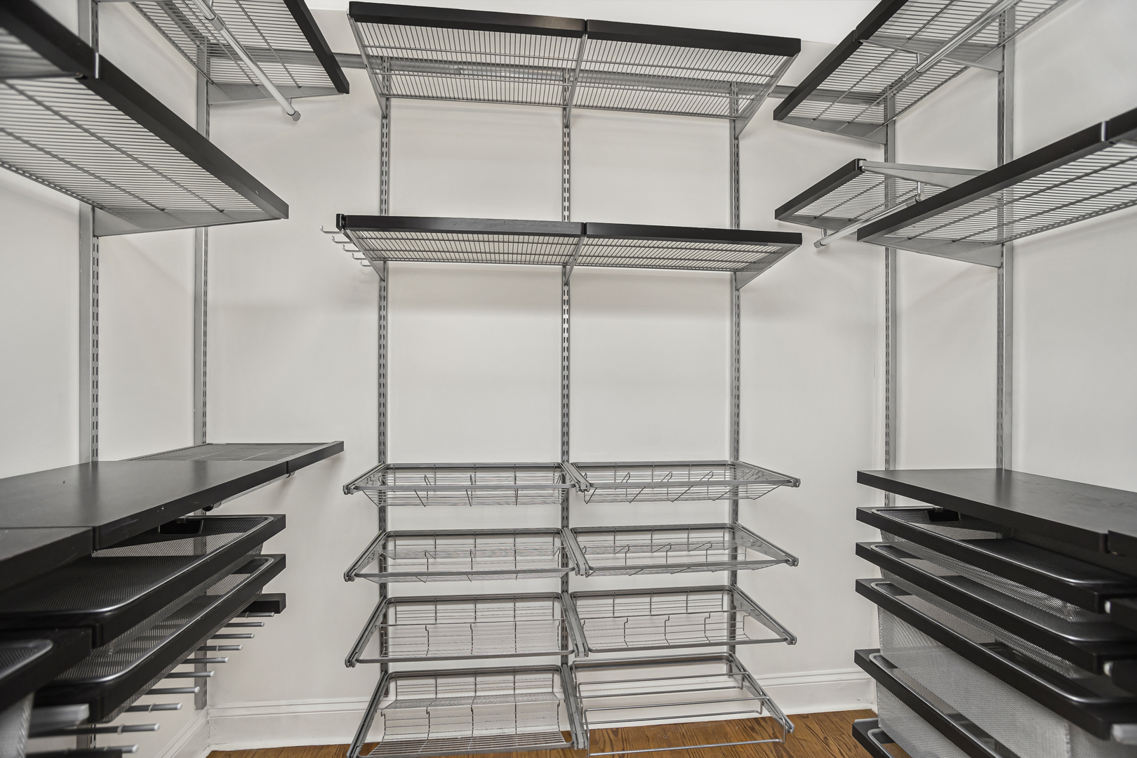 1210 West Roscoe Street, Unit 1 Chicago, IL 60657 - Photo 16 of 20 a kitchen with a stove and a microwave