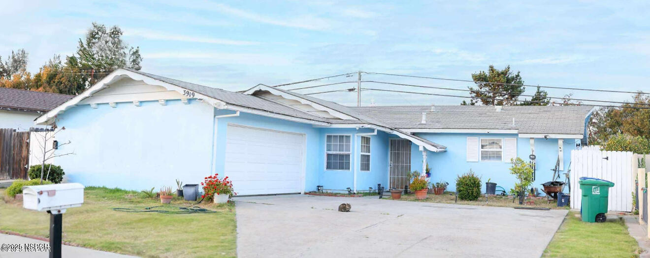 3919 Saturn Avenue Lompoc, CA 93436 - Photo 1 of 1 a view of a porch with a table and chairs