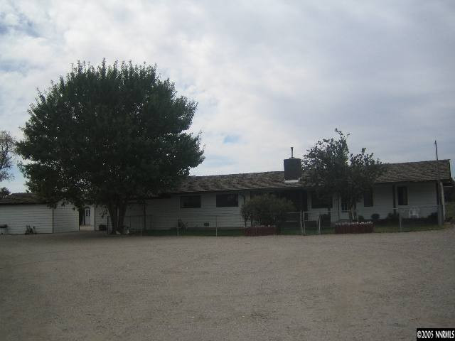 6781 Reno Highway Fallon, NV 89406 - Photo 1 of 1 a view of house with outdoor space and yard