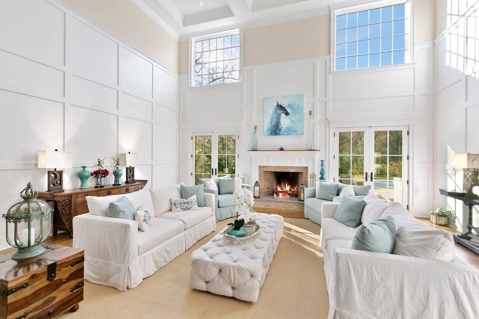 22 Gardiners Path Sag Harbor, NY 11963 - Photo 2 of 13 a living room with furniture and a fireplace
