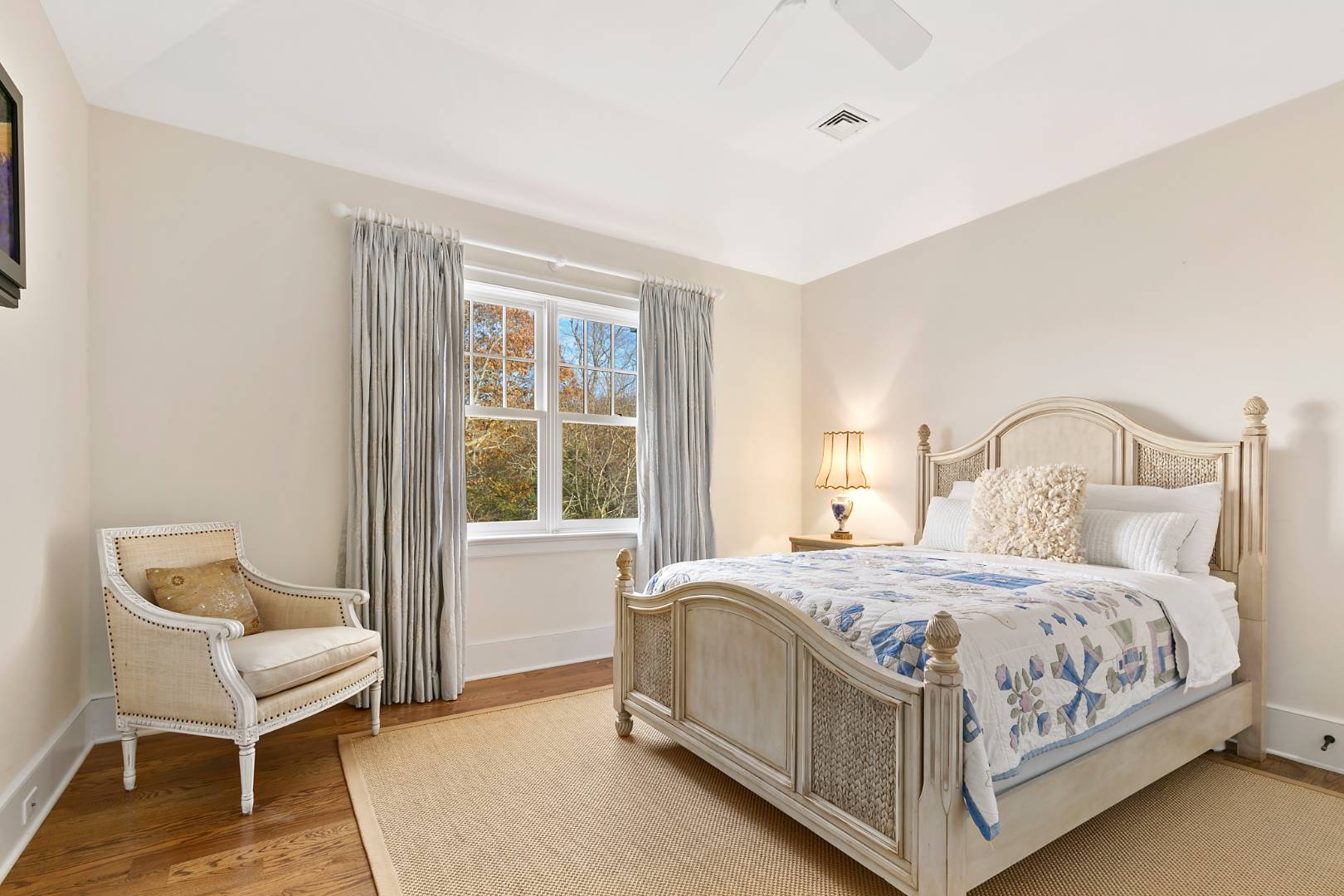 22 Gardiners Path Sag Harbor, NY 11963 - Photo 12 of 13 a bedroom with a bed chair and window