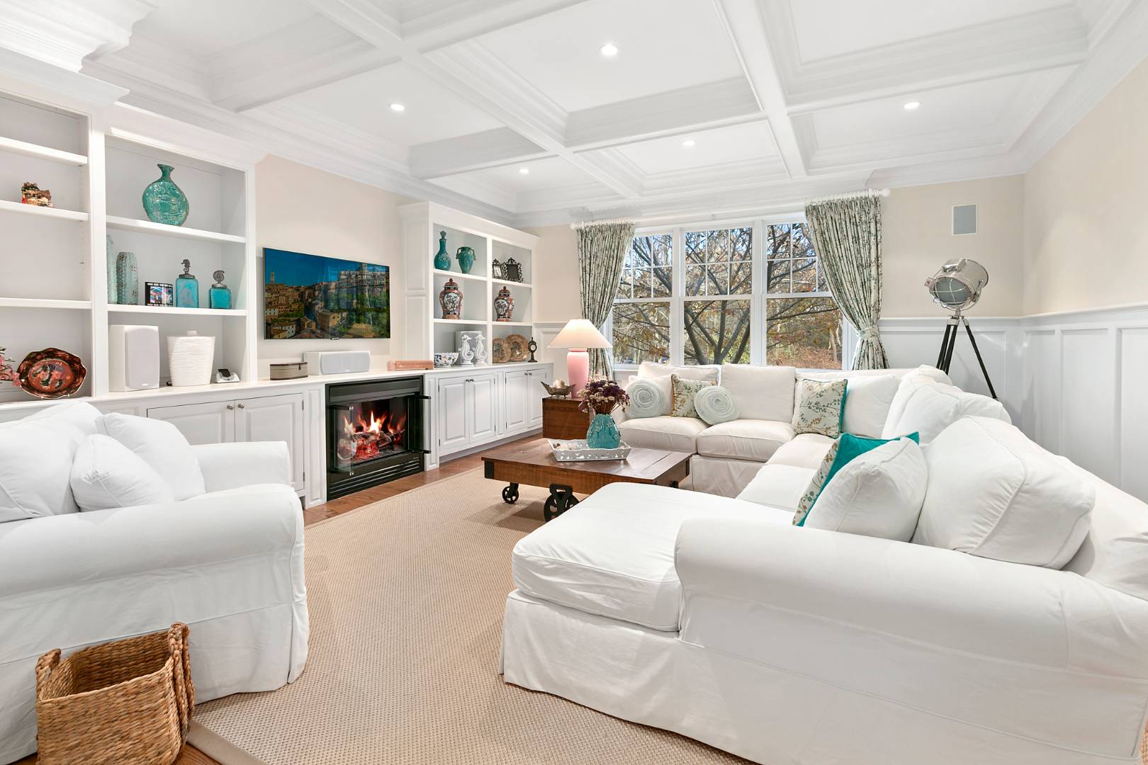22 Gardiners Path Sag Harbor, NY 11963 - Photo 4 of 13 a living room with furniture fireplace and a flat screen tv