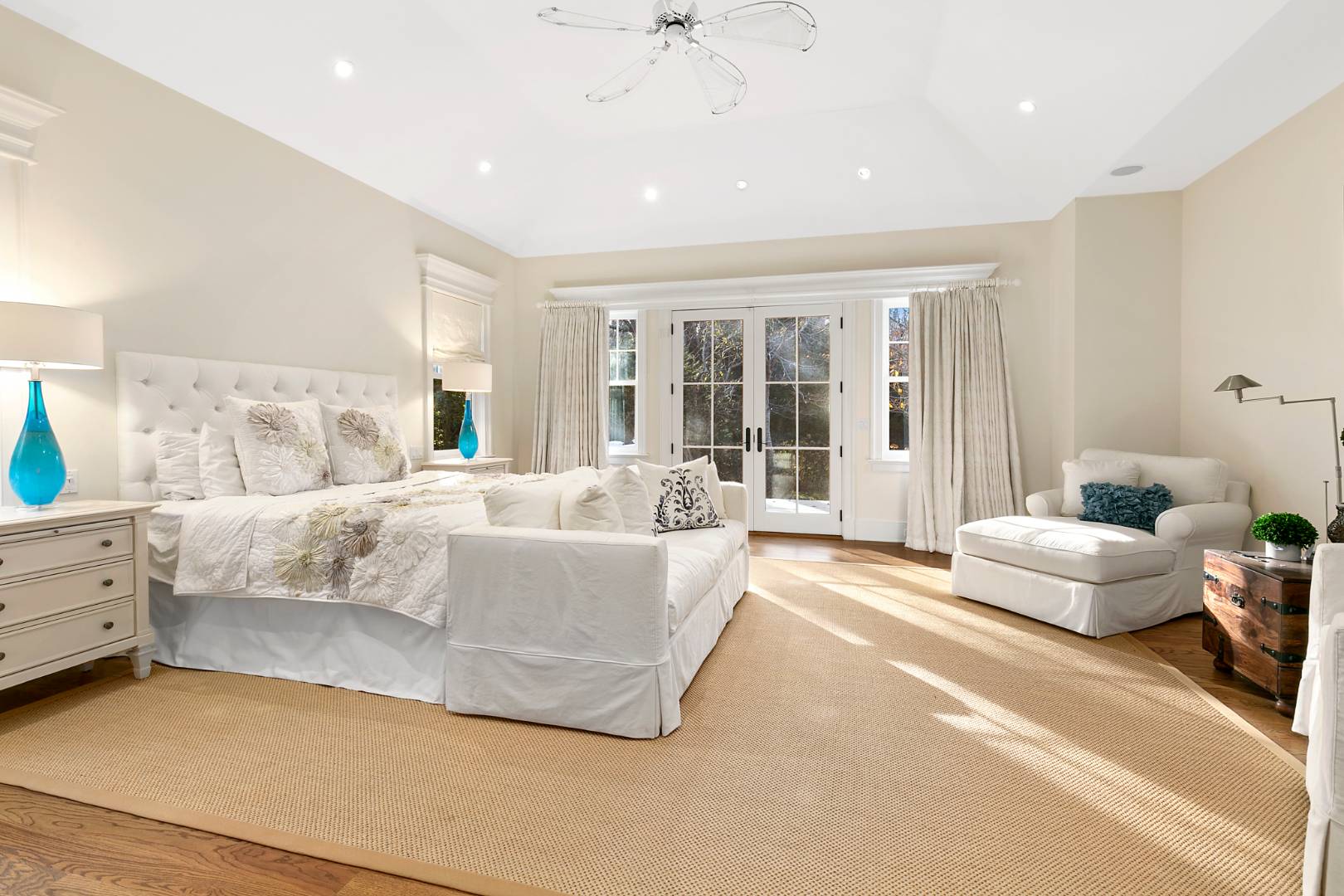 22 Gardiners Path Sag Harbor, NY 11963 - Photo 6 of 13 a living room with furniture and large windows