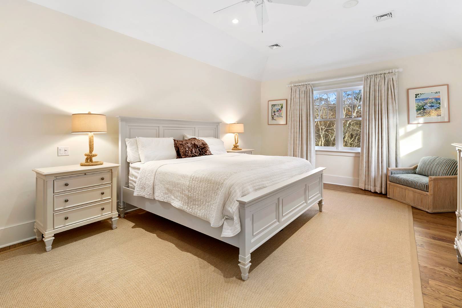 22 Gardiners Path Sag Harbor, NY 11963 - Photo 8 of 13 a bedroom with a bed and a couch