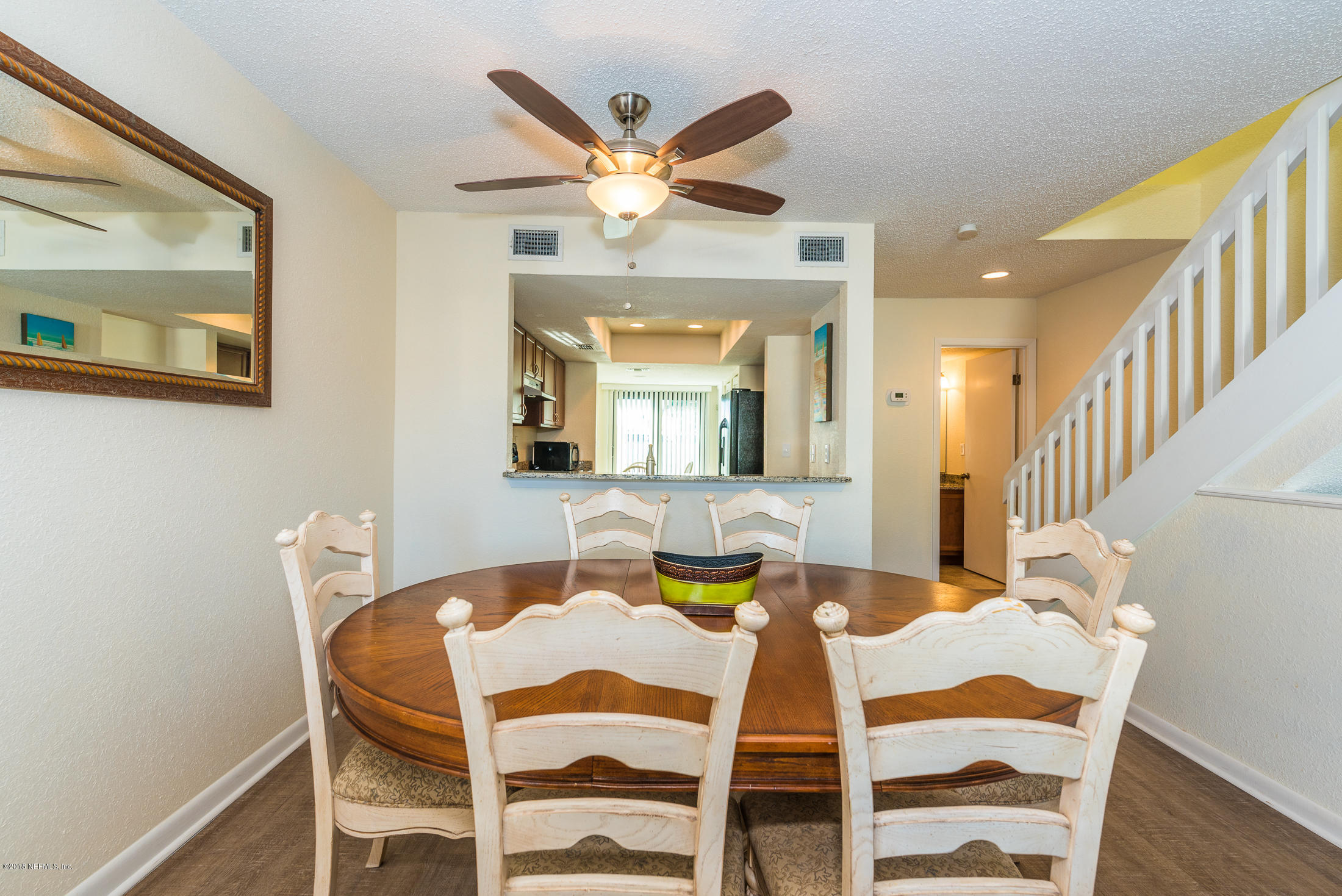 890 A1A Beach Boulevard, Unit 50 St. Augustine, FL 32080 - Photo 20 of 71 a dining room with furniture and window