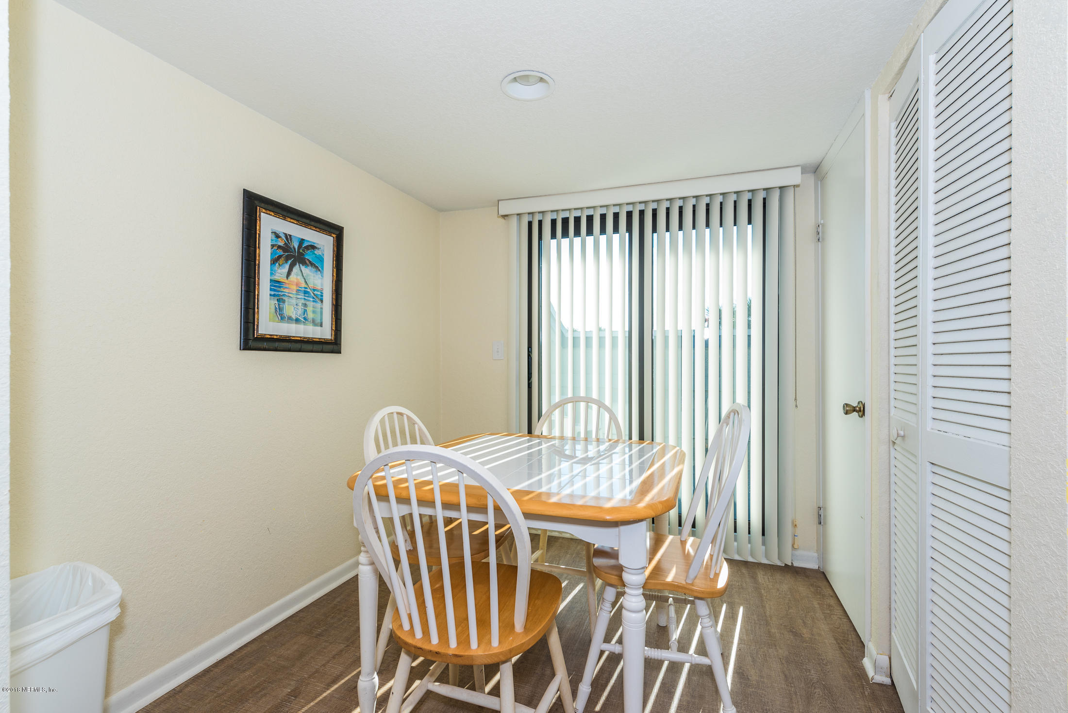 890 A1A Beach Boulevard, Unit 50 St. Augustine, FL 32080 - Photo 27 of 71 a dining room with furniture and wooden floor