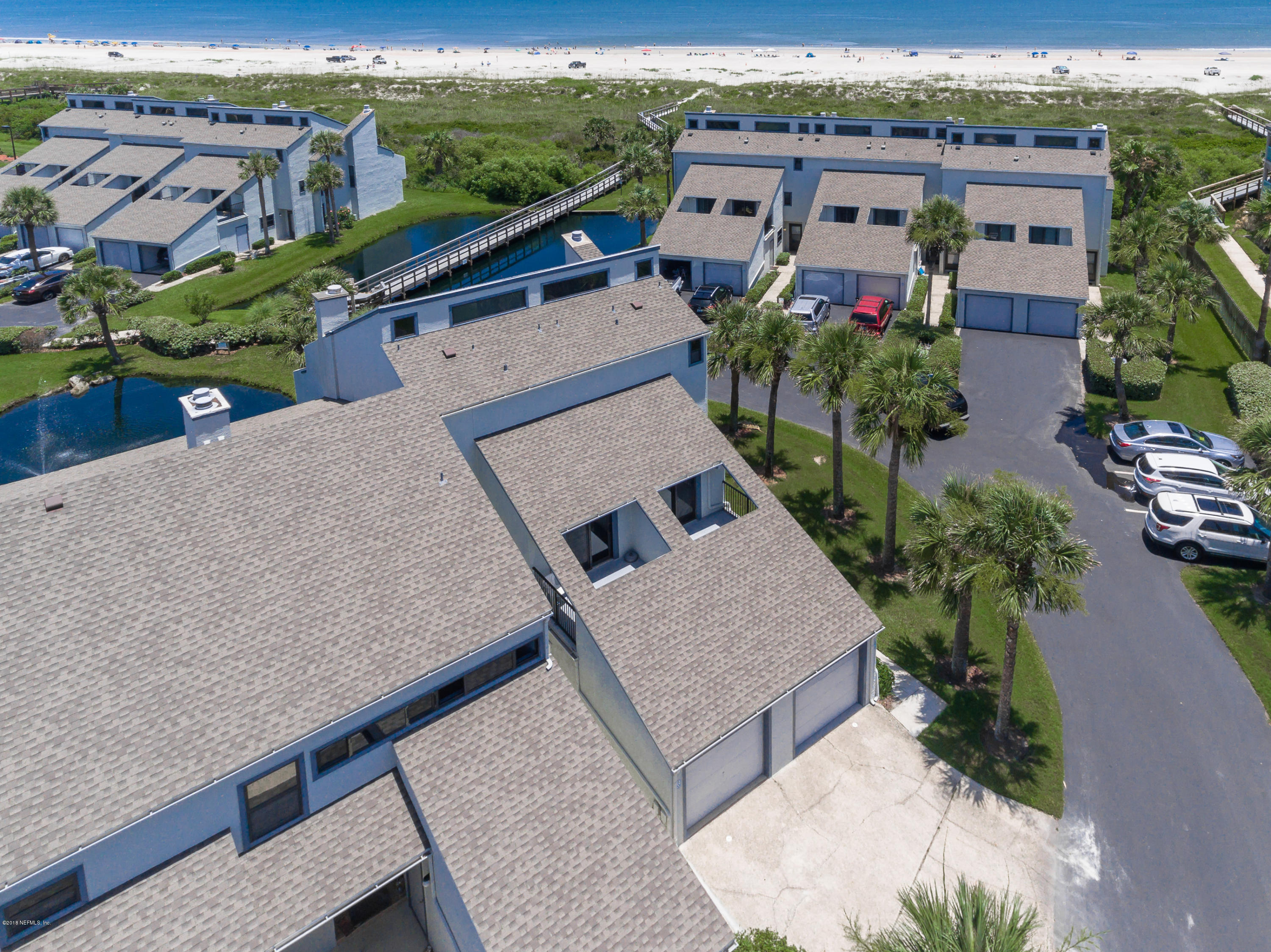 890 A1A Beach Boulevard, Unit 50 St. Augustine, FL 32080 - Photo 43 of 71 an aerial view of a house with a yard