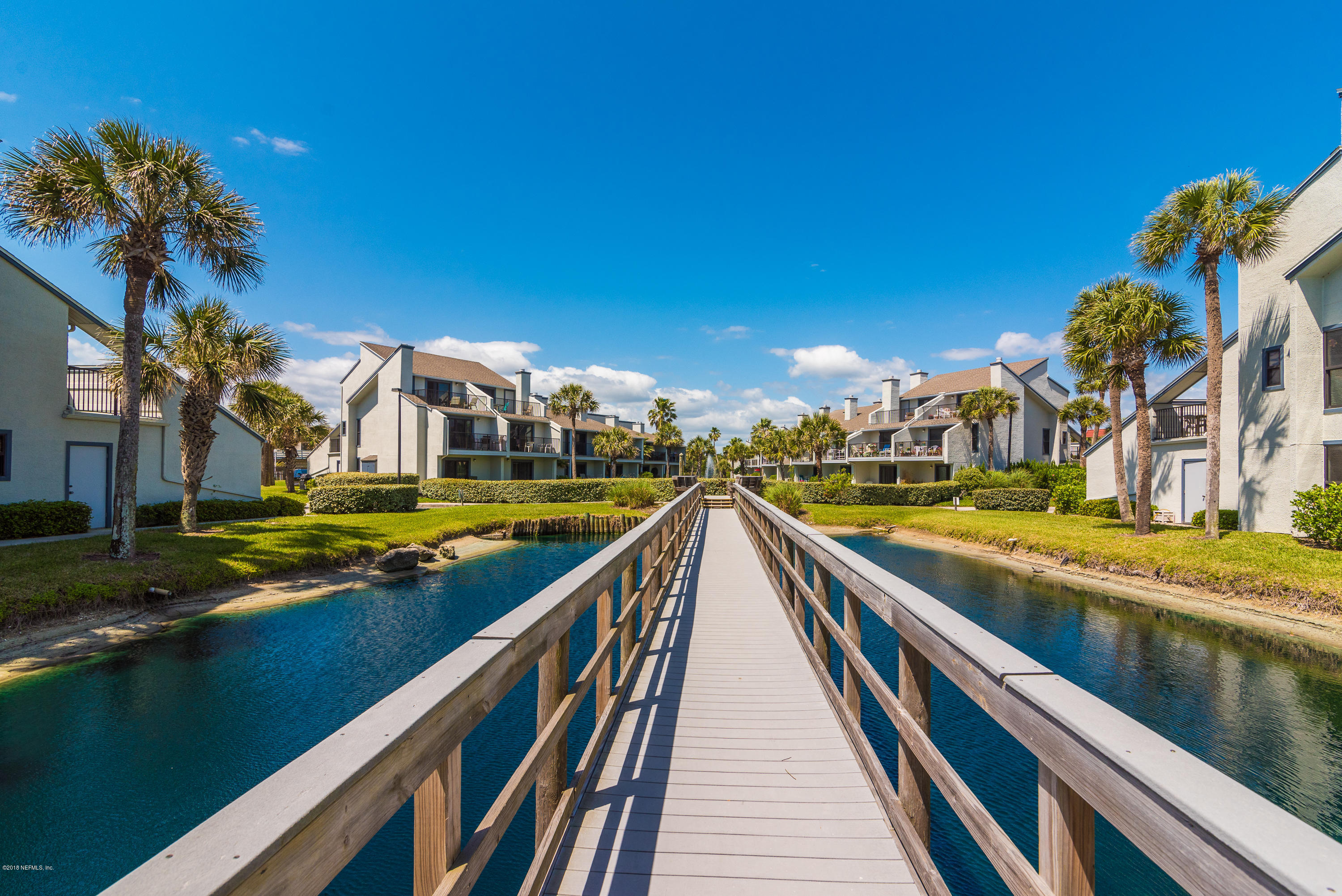 890 A1A Beach Boulevard, Unit 50 St. Augustine, FL 32080 - Photo 59 of 71 a view of yard with swimming pool and outdoor seating