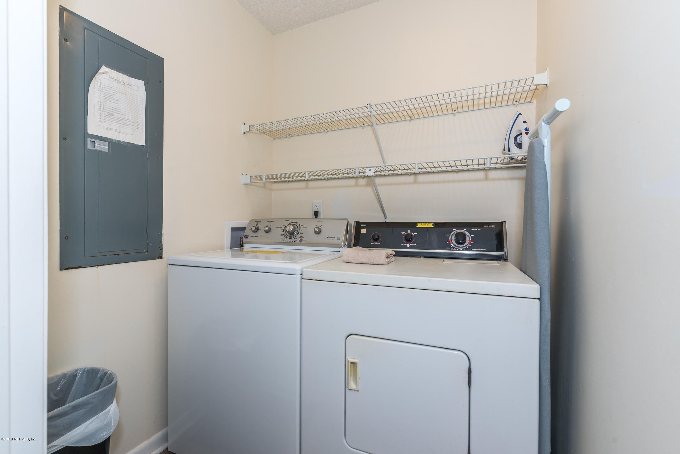 890 A1A Beach Boulevard, Unit 50 St. Augustine, FL 32080 - Photo 7 of 71 a utility room with dryer and washer