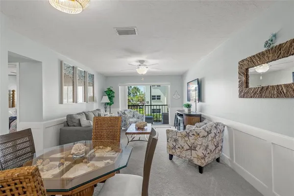 a view of a dining room with furniture
