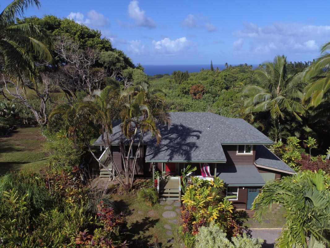 101 West Waipio Road Haiku, HI 96708 - Photo 29 of 30 an aerial view of a house with yard and outdoor seating