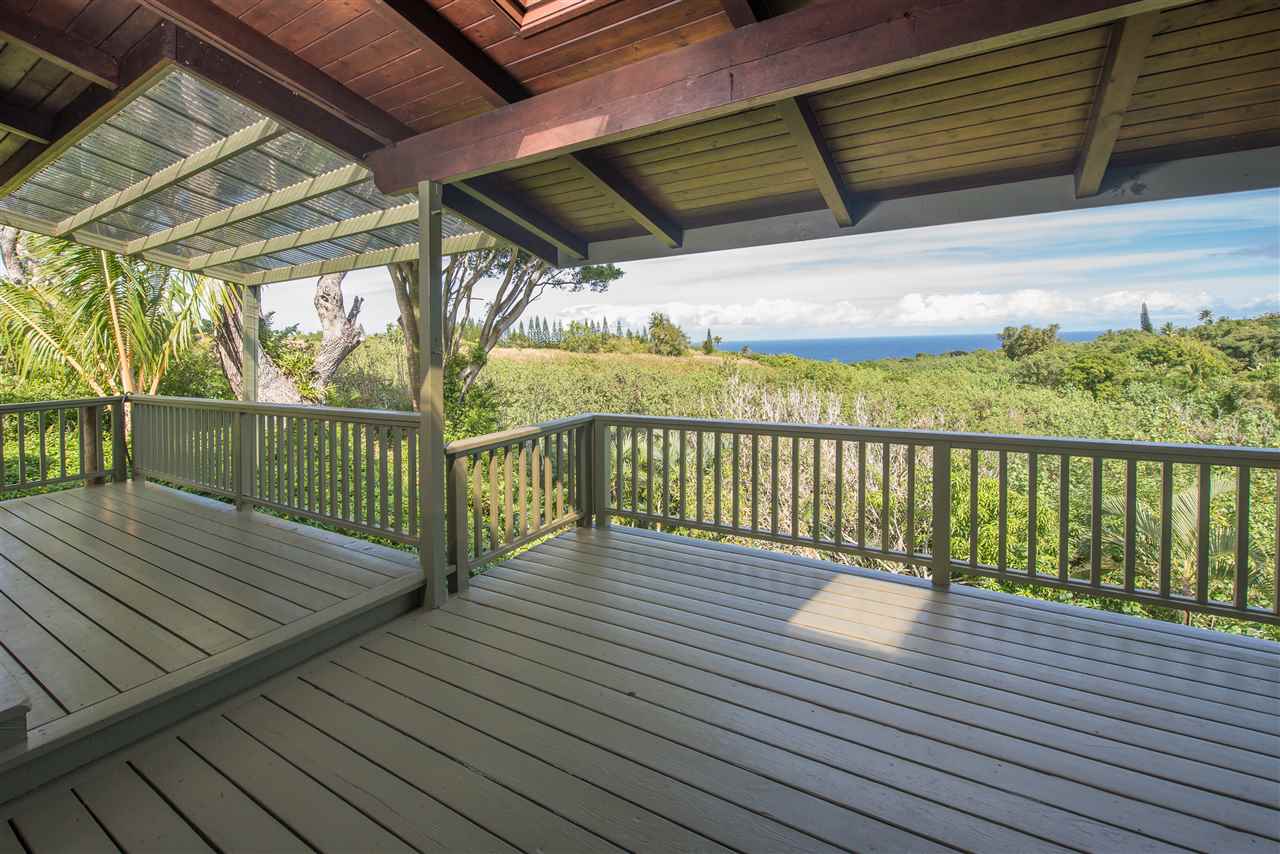 101 West Waipio Road Haiku, HI 96708 - Photo 3 of 30 a view of deck with wooden floor