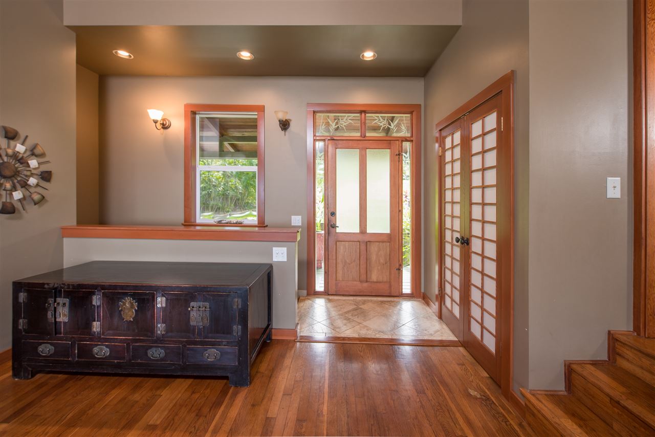 101 West Waipio Road Haiku, HI 96708 - Photo 8 of 30 a view of entryway with a window and wooden floor