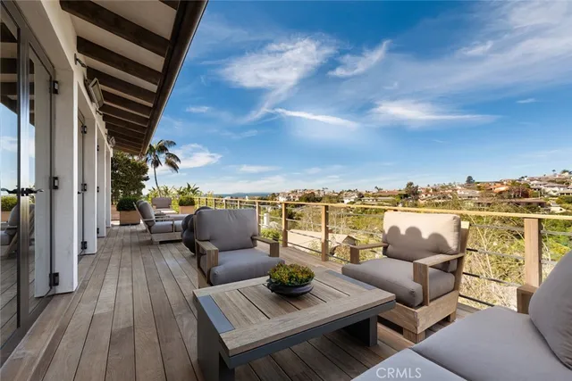 a view of a roof deck with couches